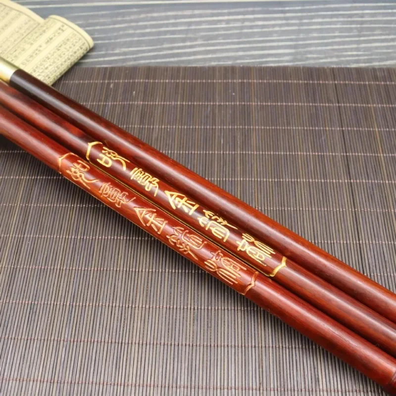 

Золотой обруч Ruyi из палисандра 45 см, резной с позолоченной палочкой для боевых искусств