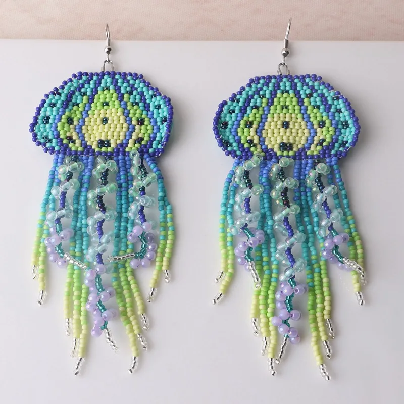 Rice bead earrings Tassel Medusa Design Originality Hand knitting Gradient Bohemia Alloy Fashion Simple Beaded earrings