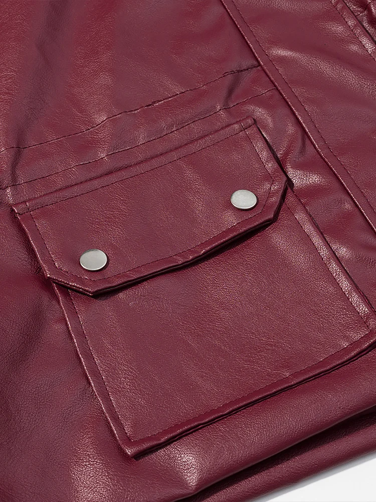 Nouvelle veste en cuir ample à col haut de couleur unie pour femmes de style européen à la mode et polyvalente avec détails de poche.