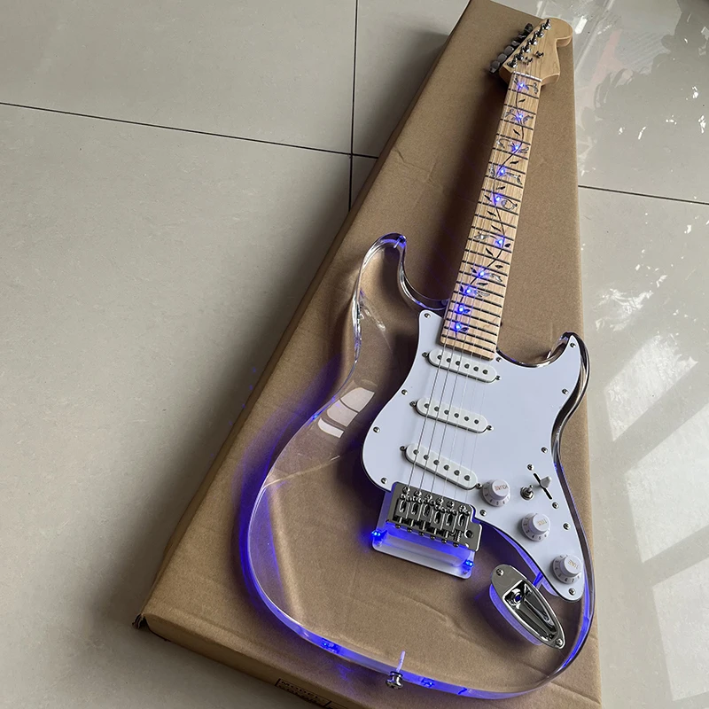 

Classic st electric guitar, acrylic, carved luminous fingerboard, professional performance level, free delivery to home.