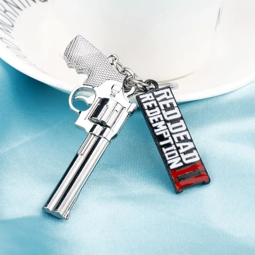 Imagen 2 del producto 1 colgante de llavero de pistola alrededor del juego.