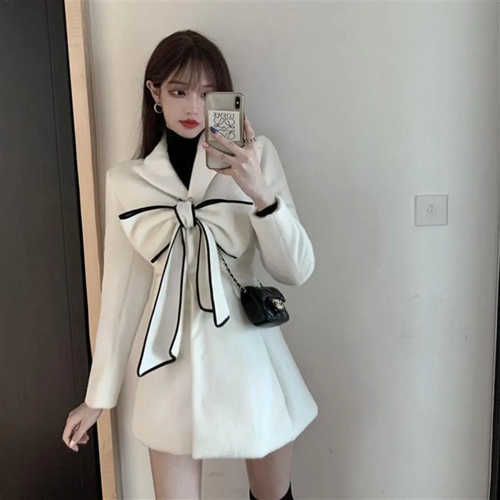 2024 Winter New Ladies Korean Version Of Slim Temperament Sweet Bow Woolen Coat Tide Fashion Foreign Style Woolen Coat.