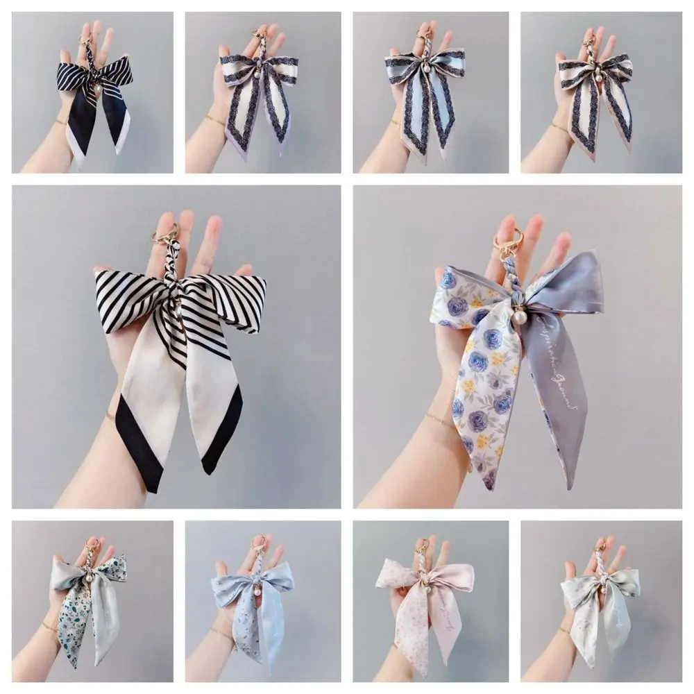 الإبداعية اللؤلؤ وشاح القوس المفاتيح زهرة مطبوعة Bowknot حقيبة قلادة الحبل حقيبة الديكور حقيبة الملحقات مفتاح الملحقات