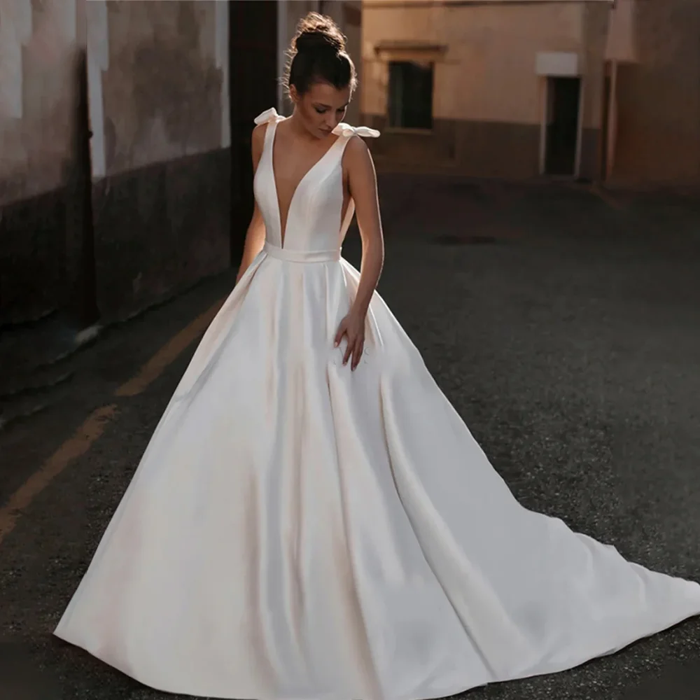 MANRUIXIN personnalisé une ligne robes De mariée Satin nœud papillon sans manches Robe De mariée col en v dos nu Robe De mariée robes De Noiva