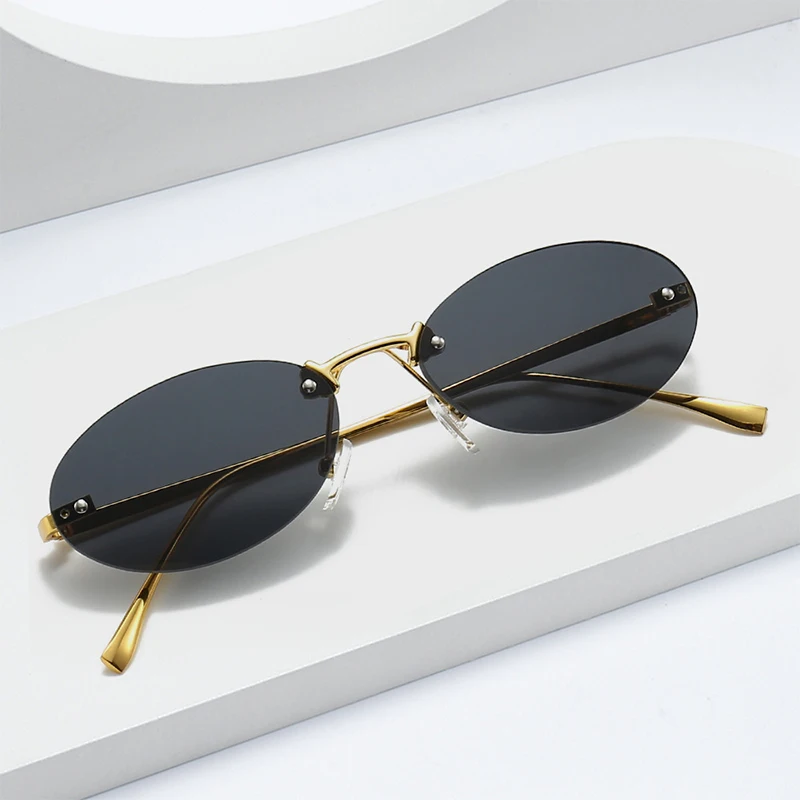 Rimless Oval Women\'s Sunglasses New Retro metal frame small Cat Eye Sun Glasses Men Shades Punk Driving Eyewear Glasses Female
