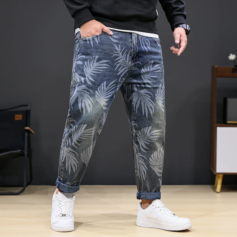 8XL oversized jeans men's fashion leaf printed trendy casual stretch denim plus sizes loose 150kg fat pants