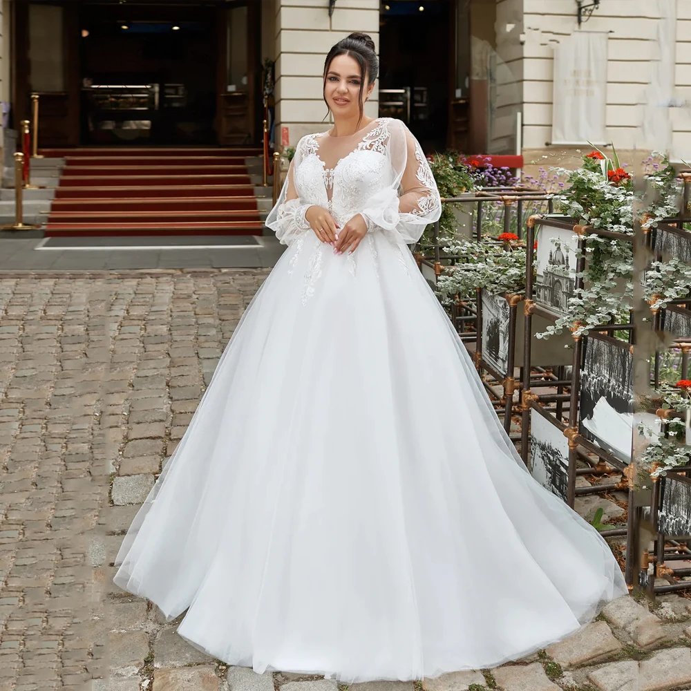 Eleganckie tiulowa suknia ślubna Plus Size z dekoltem z długim rękawem suknie panny młodej aplikacje do podłogi długość a-line Vestidos De Novia