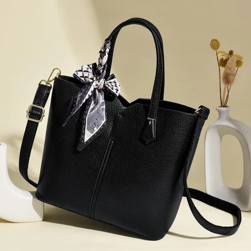 

Elegant Textured Leather Crossbody-Bag With Unique Retro Design And Solid Color Also Functions As A Practical Diaper Bag