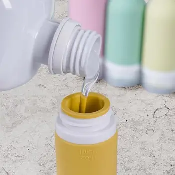 Sada 12 cestovních lahví, silikonové nepropustné stlačitelné nádoby schválené TSA na toaletní potřeby, kondicionér, šampon, mléko a... 8 nejlepší prodej velkoobchod s prázdnými lahvemi od šamponu - №5