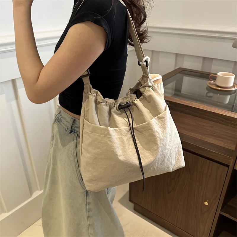 New Niche Design Nylon Shoulder Bag Fashion Solid Color Pleated Crossbody Bag Casual Versatile Students Commuting SaddleBag