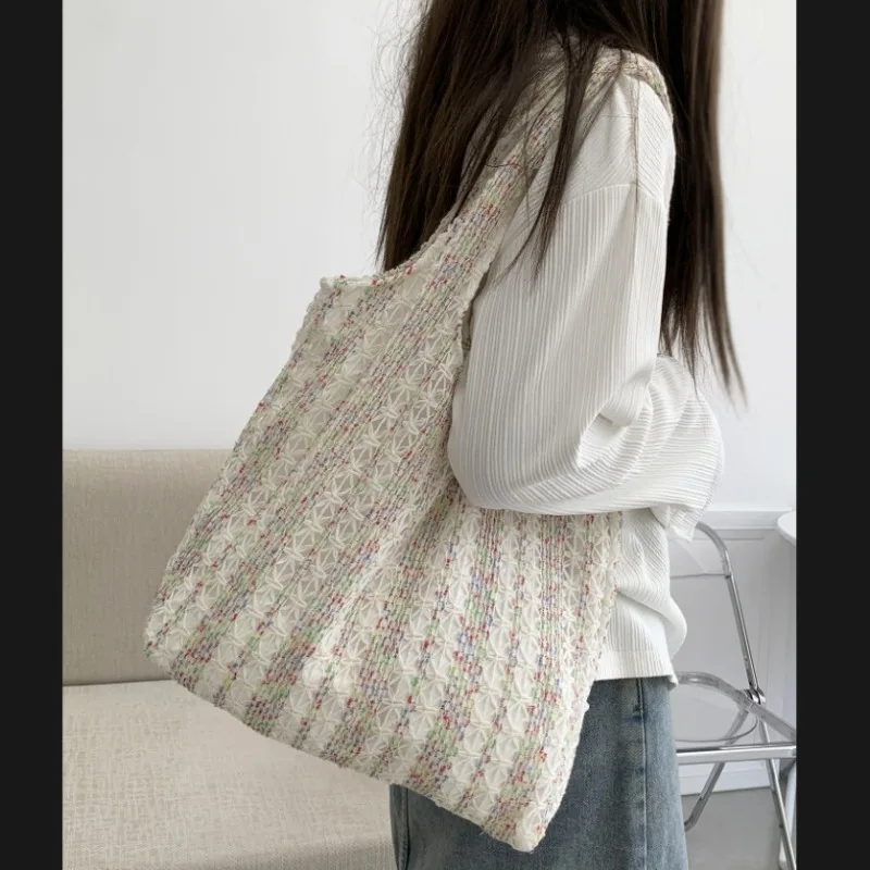 

1pcs Women's casual knit canvas shoulder bag with ample capacity suitable for commuting traveling and daily carrying