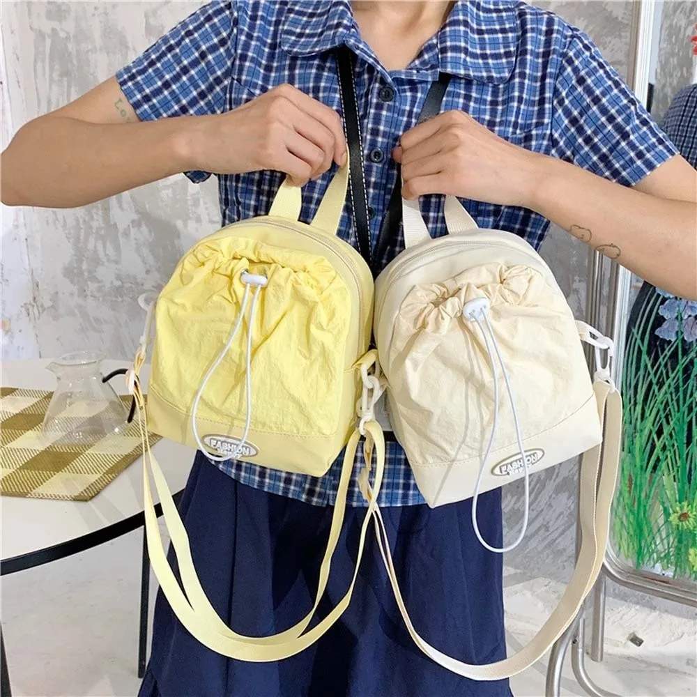 

Large Capacity Drawstring Crossbody Bag Anti-splash Water Dopamine Oxford Cloth Shoulder Pouch Japanese Style Solid Color