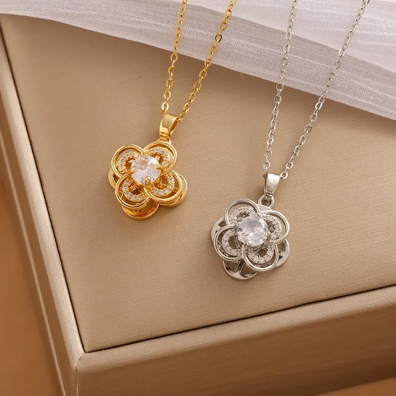 

Necklace women's new rotating four-leaf flower necklace pendant full of diamonds sunflower