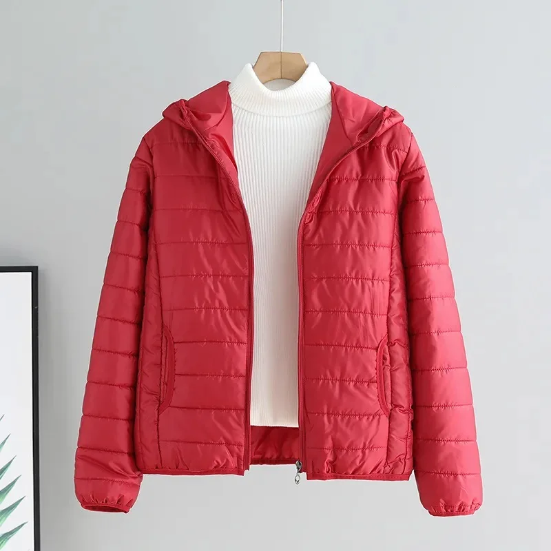 2025 Otoño e Invierno nuevo abrigo de algodón para mujer estilo corto coreano ajustado versátil Color sólido fino abajo