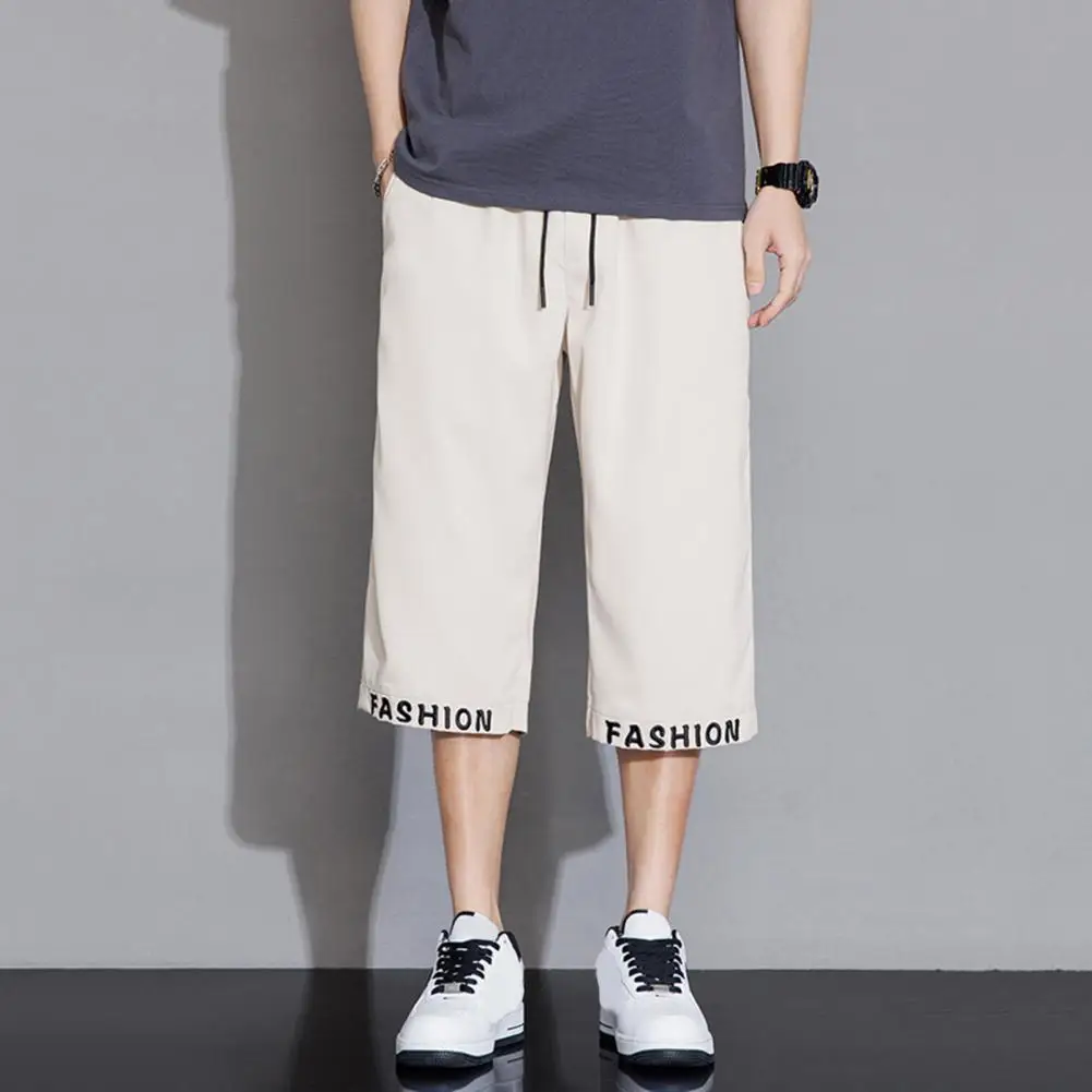 

Comfortable Men Bottoms Stylish Men's Cropped Pants with Elastic Waistband Drawstring Featuring Letter Embroidery for Casual