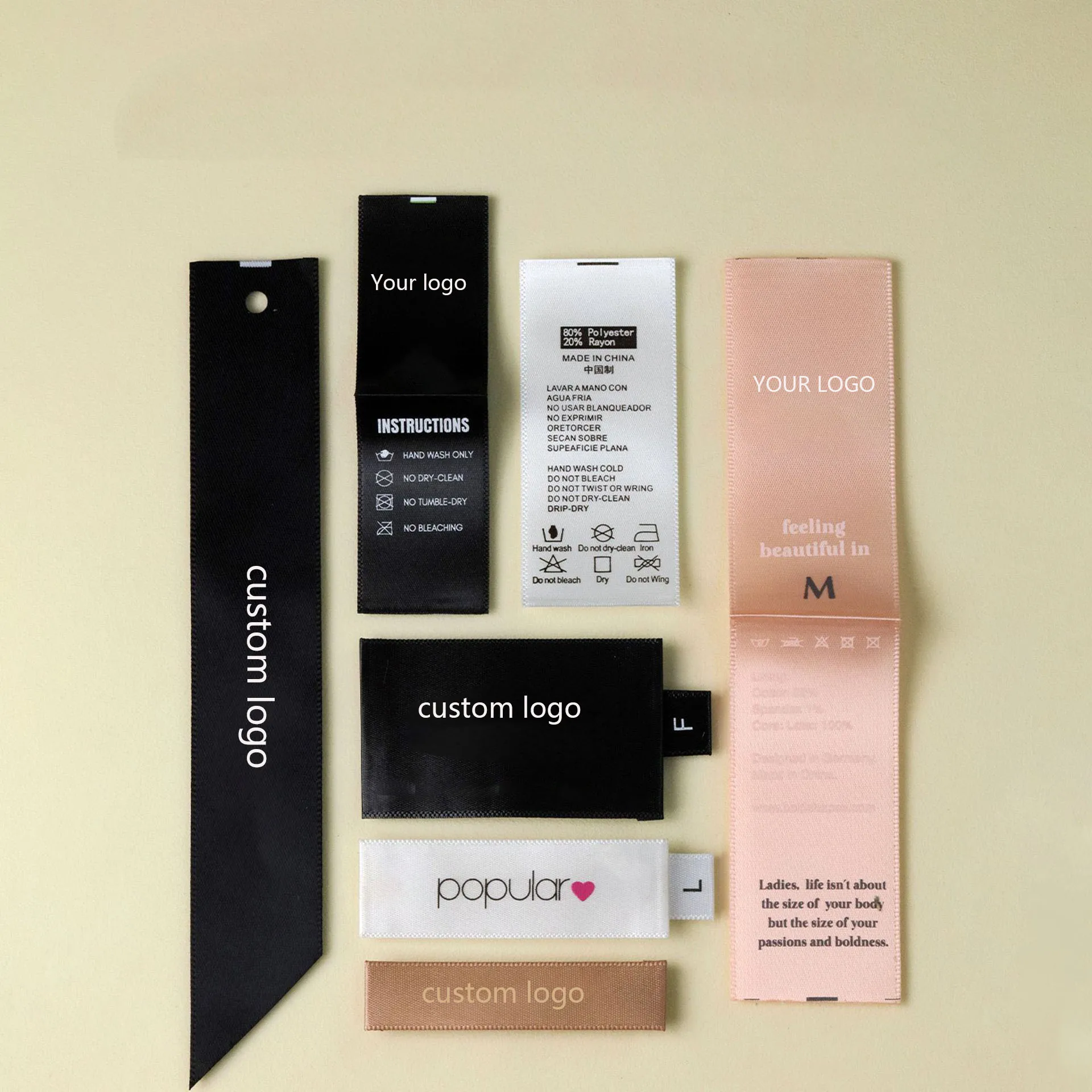 50 قطعة من ملصقات الملابس الساتان المخصصة - علامة محتوى الرعاية، 100% بوليستر، أسود/أبيض، مقاسات متعددة، ملصق قماش الخياطة OEM