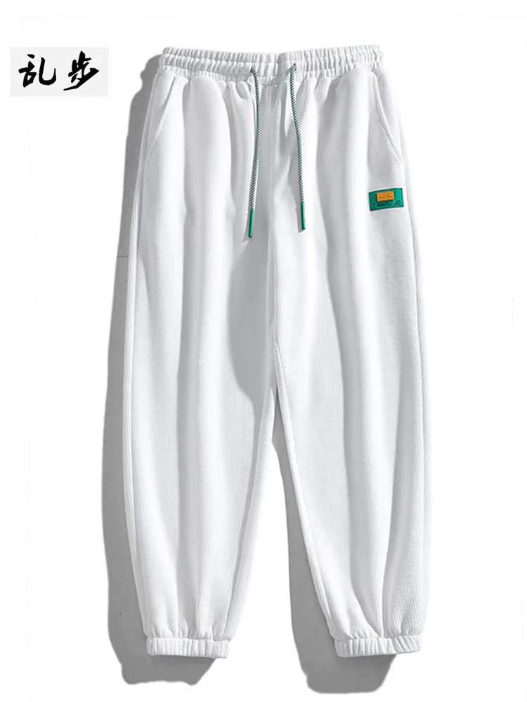 

Men's Casual Sports Pants Conical ape Pure Color Loose Fit Straight Leg Long Trousers Faionable Korean Sle Joggers