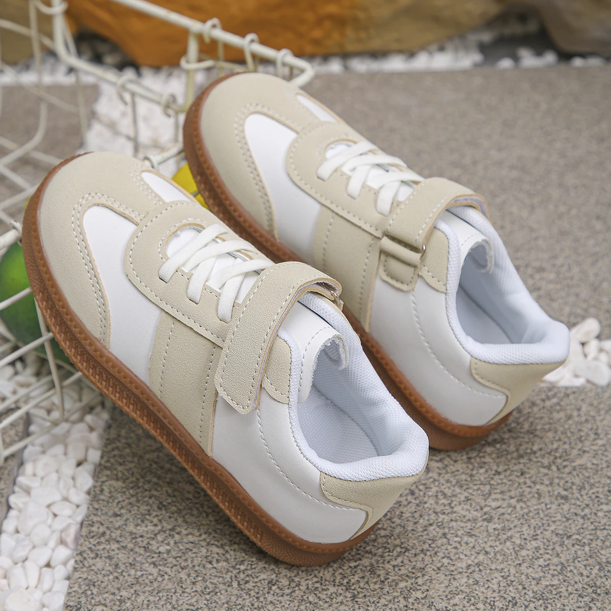 A Pair of Simple Color-Blocked Single-Button Sneakers for Boys and Girls for the Back-To-School Season