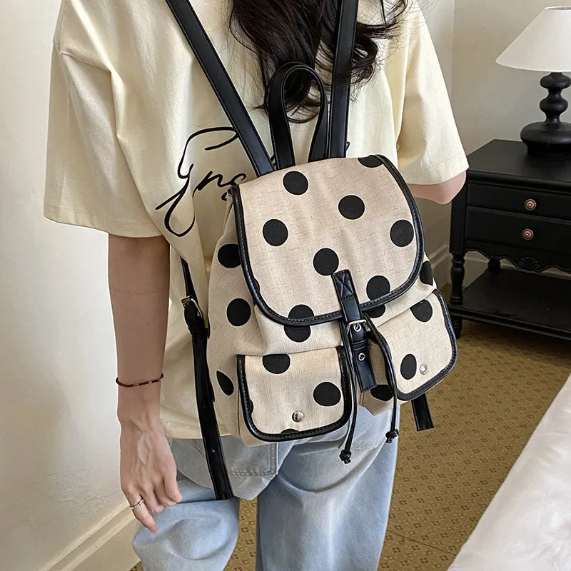 Korean-style polka dot canvas backpack for women2026New Fashionable Commuting Drawstring Multi-Pocket Backpack Student School Ba