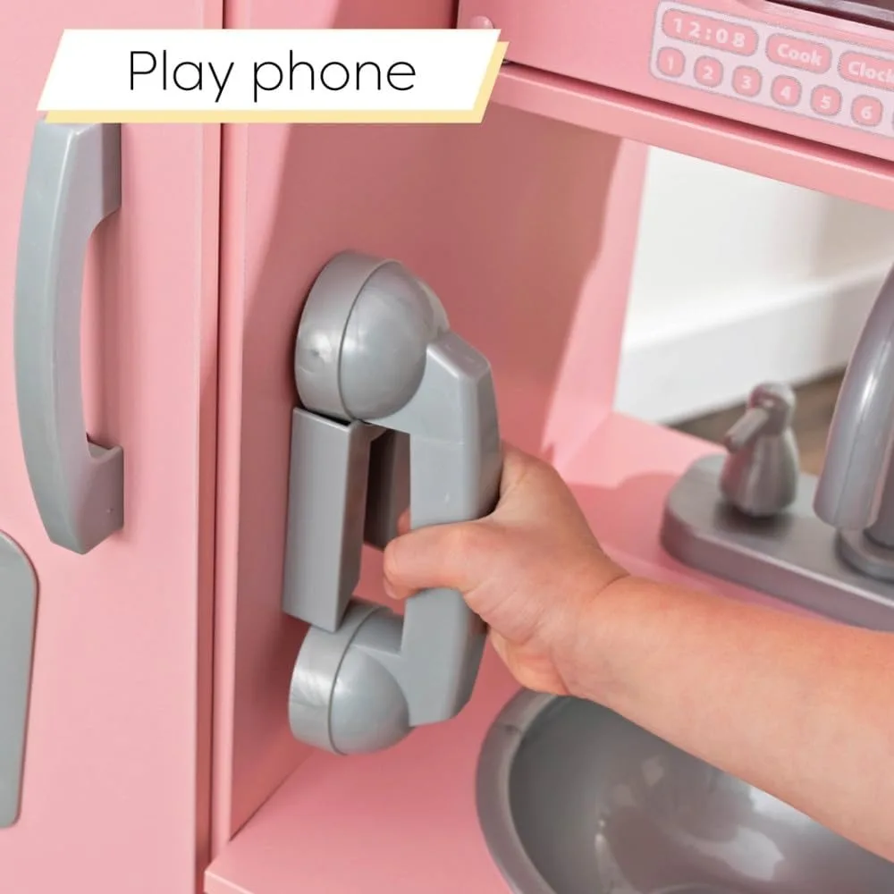 Cocina de juegos de madera vintage con máquina de hielo de imitación y teléfono de juego, rosa