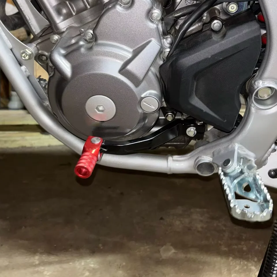 thumbnail interactive-video image 1 of Red Rear Brake Pedal For Honda CRF300L 2021-2024 - Foldable CNC Aluminum Foot Brake Lever 1 of 2