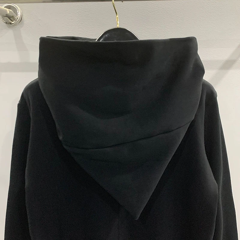 Otoño diseño de cremallera sudaderas con capucha negras chaqueta deportiva para hombres y mujeres American Rock Hip Hop Street Wear abrigos de punto elásticos