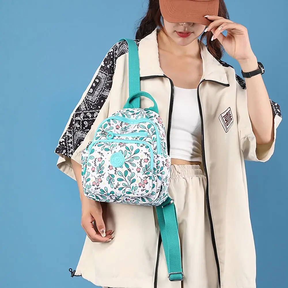 Mochila de nailon con estampado práctico para hombre y mujer, bolso escolar impermeable de gran capacidad para estudiantes