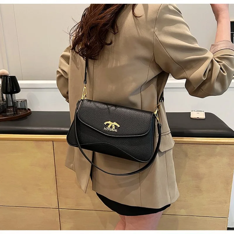 

High-Fashion Women Bag With Architectural Angular Design In Stiff Leather For A Bold Avant Garde Look