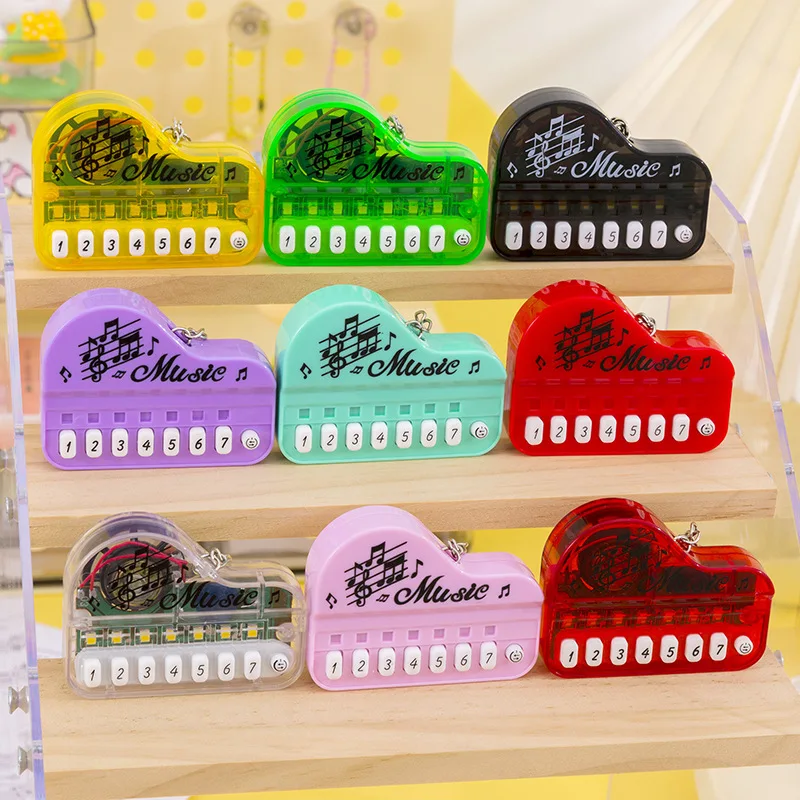 Creative Mini Electronic Piano Game Keychain Pendant 7 Keys Luminous Music Toy Keyring for Kids Backpack Pendant Pocket Gifts view 2