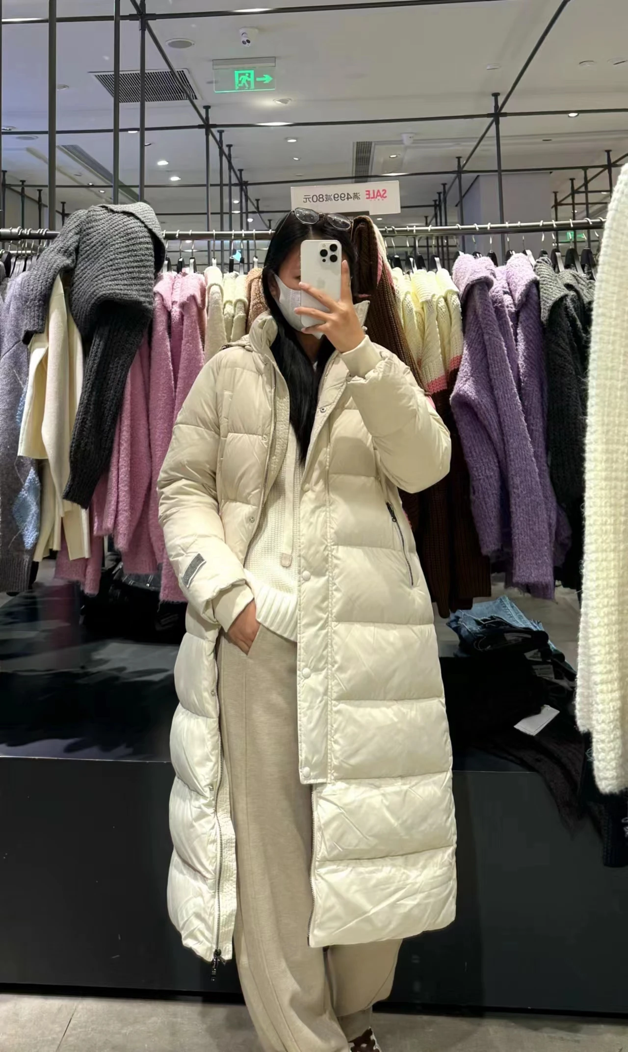 Winter long thickened paneled wide waist down coat decorated with a belt