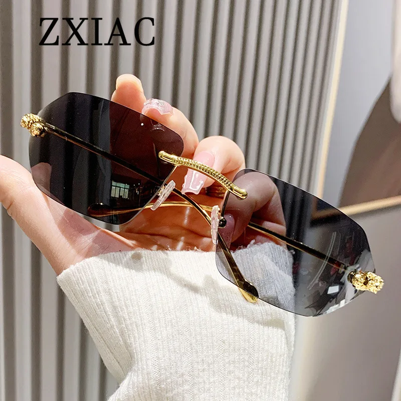 ZXIAC New Fashion Rimless Sunglasses Brand Designer Metal Leopard Decorative Sun Glasses Women Men Large Frame Frameless Shades