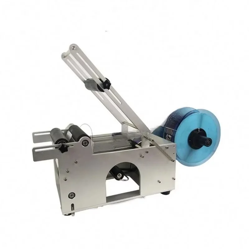 Desktop electric manual labeling machine for round and beverage bottles