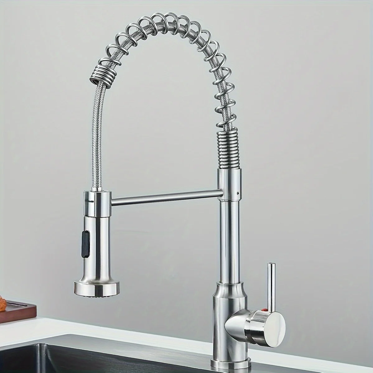 

Matte Black Kitchen Faucet Featuring a Pull-Out Spray, Designed for Commercial Use with a Single Handle Lever. This Mixer Tap