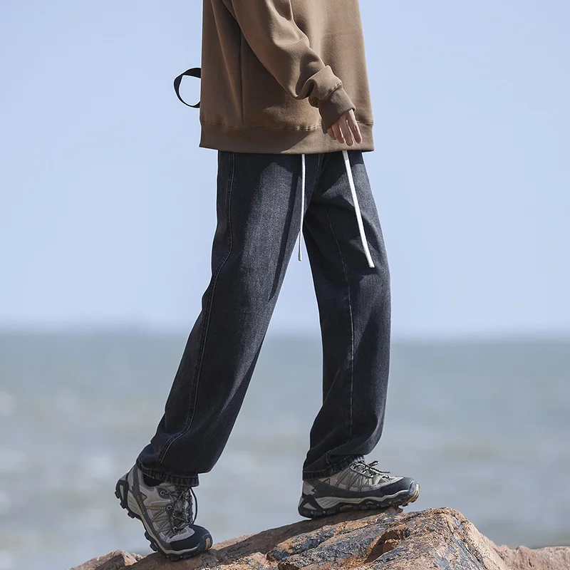 Pantalones vaqueros de pierna ancha con cintura elástica para hombre, ropa de calle Retro coreana, pantalones de diseñador de gran tamaño con cordón, nueva moda