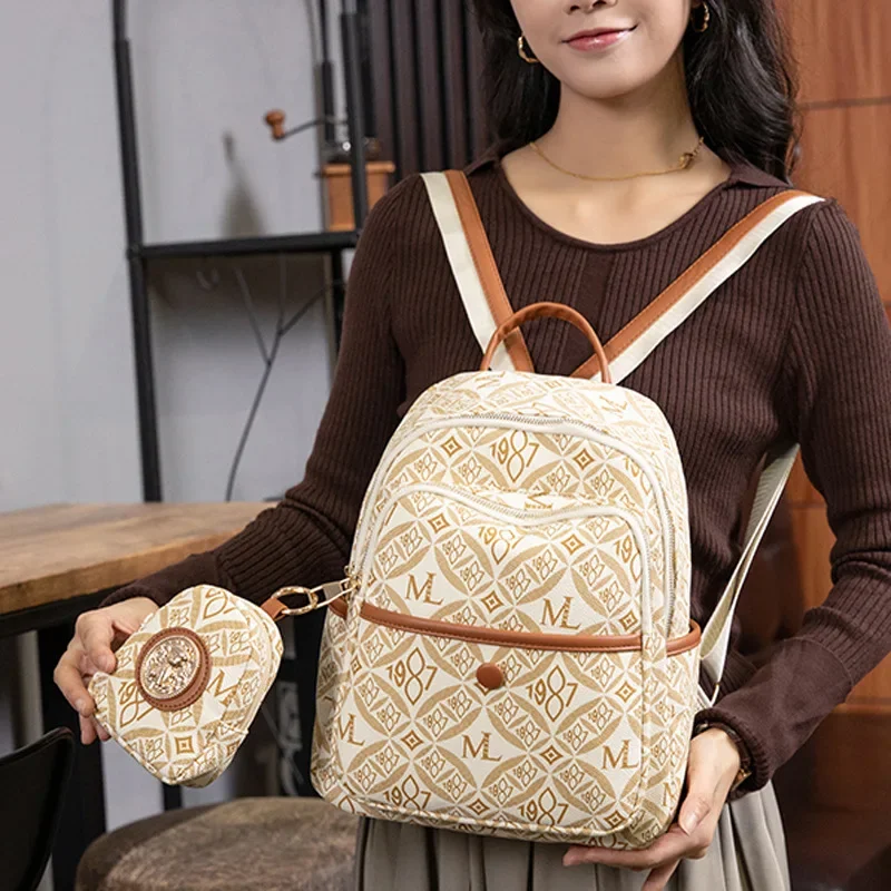 

2025 Women's Backpack Soft Leather with Retro Texture Spacious for Commuting Leisure and Travel, Mother Child Two Piece Package