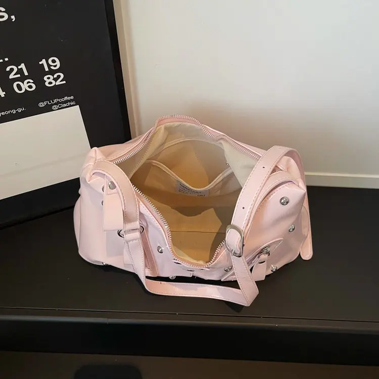 

Korean Version of Locomotive Wind Rivet Soft Leather Tote Bag New Large-capacity Daily Commuting Shoulder Armpit Bag