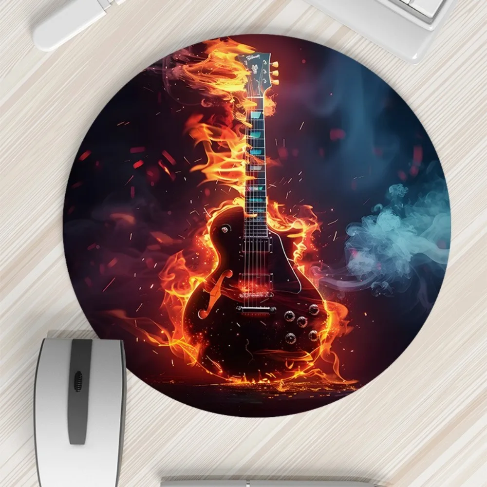 

The circular mouse pad with a printed flame guitar design and waterproof and anti-slip rubber is suitable for gamers