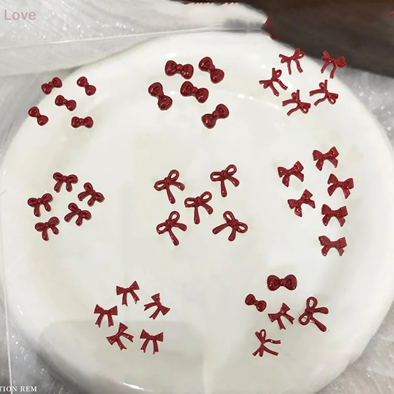 100 個 3D ネイルアート赤い弓チャーム用品かわいいアクセサリー樹脂爪の装飾製品マニキュア装飾材料ツール