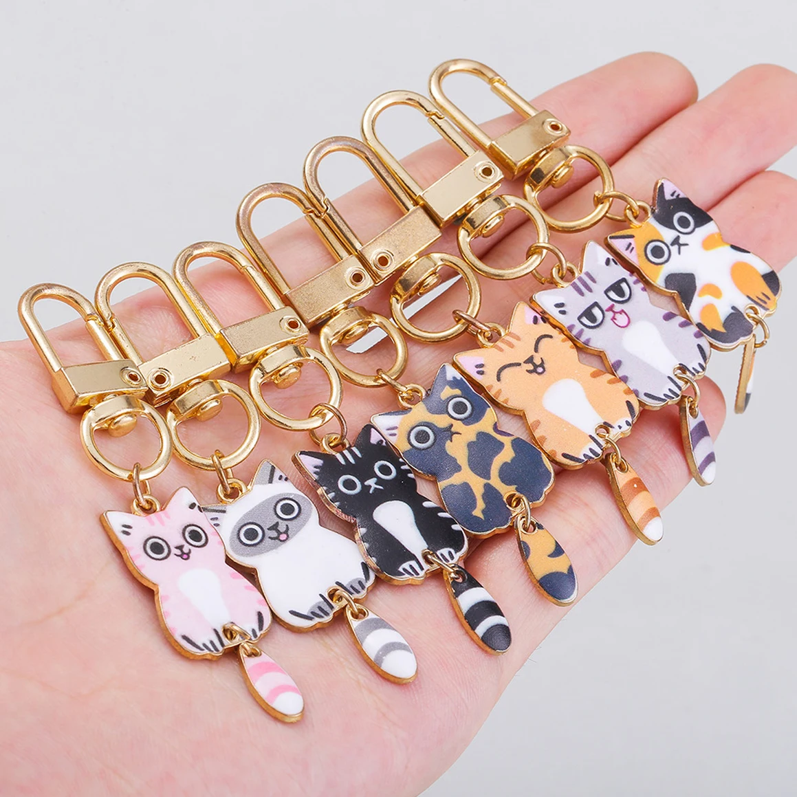 Kawaii Wagging Tail Cat Key Rings Creative Enamel Kitten Metal Keychains Earphone Case Pendant Bag Ornaments Souvenir Gifts