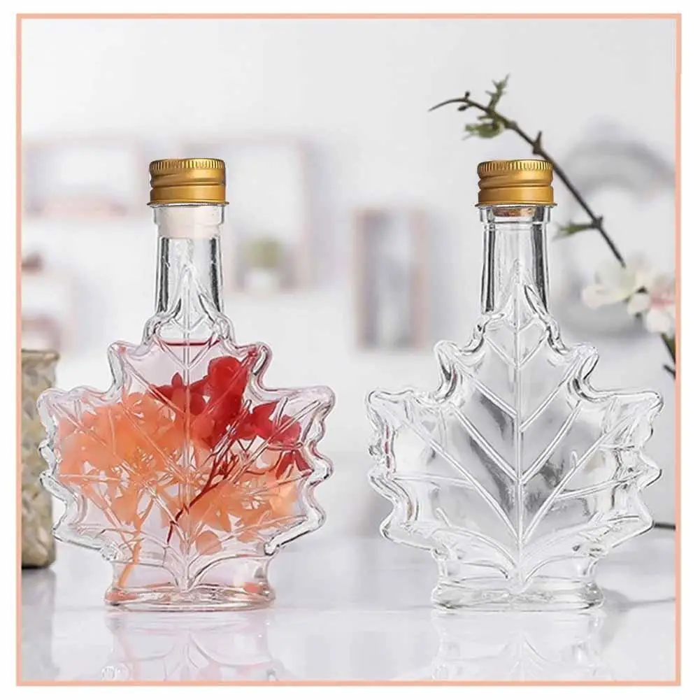 50ml 100ml 250ml Mini Maple Leaf Shape Whisky Alcohol Canning Small Wine Syrup Glass Bottles With Cover For Liquor Scotch
