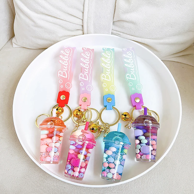 Cute Liquid Pearl Milk Tea Cup Astronaut Key Chain Creative Quicksand Floating Jelly Bean Keyring Backpack Pendant Keychain Gift