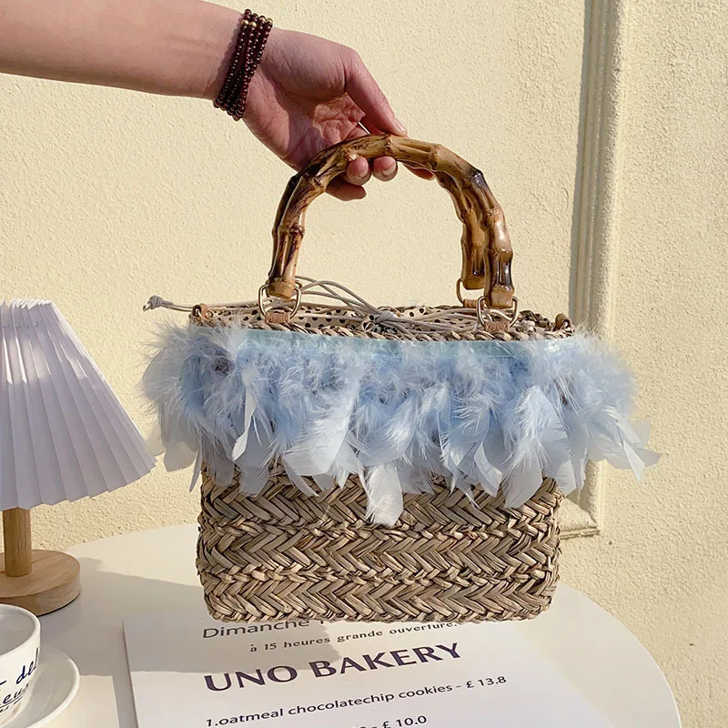 

2025 Fashion Designer Women Feather Straw Handmade Woven Handbags Handle Bamboo Travel Tote Bag Casual Crossbody Beach Bag