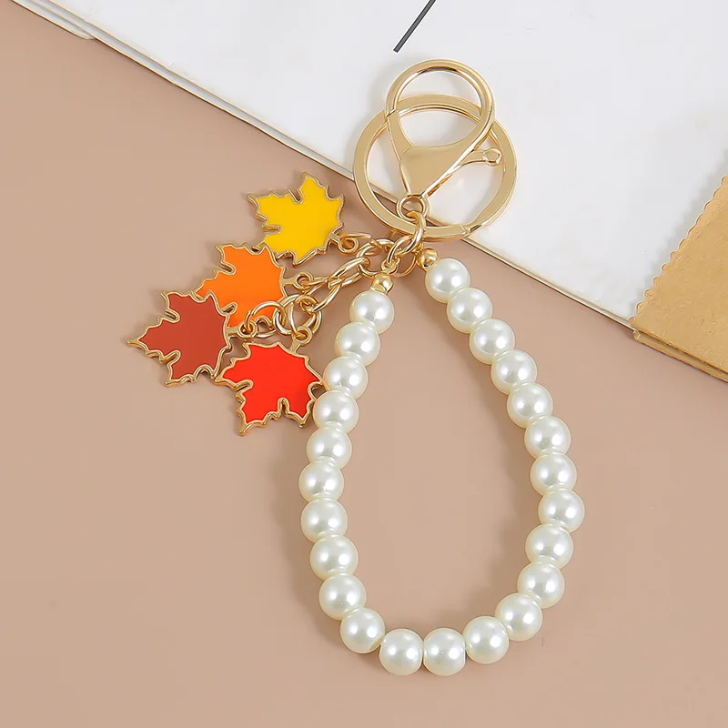 6pcs/lot Alloy Red Maple Leaves Or Pearl Keychain Multi Pcs Set Low MOQ Fashion Bag Pendant