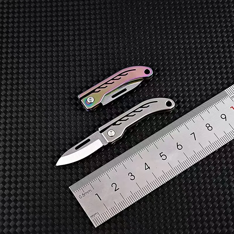 Titanium Alloy Mini Folding Knife Made of High Hardness Steel for Quick Opening, Portability, and Strong Practicality