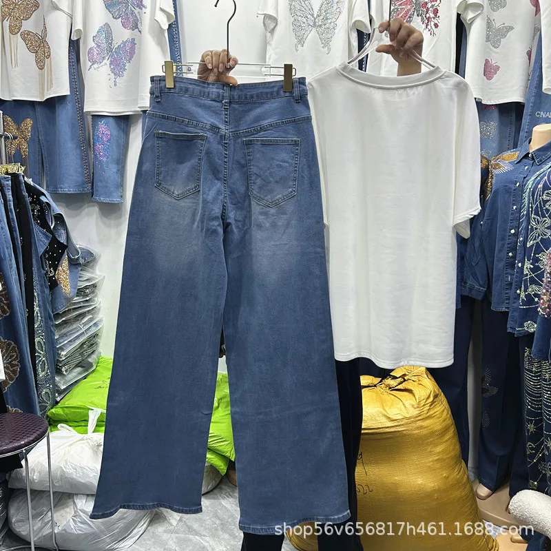 ชุดเซ็ตสองชิ้นสำหรับผู้หญิงแฟชั่น ลายดอกไม้ 3 มิติ ประดับเพชร เสื้อยืดแขนสั้นทรงหลวม + กางเกงยีนส์ทรงตรงเอวสูงขากว้าง