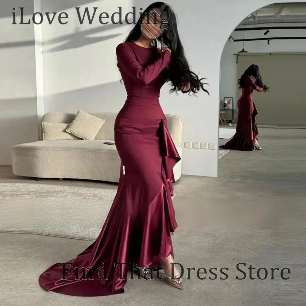 ชุดราตรีทรงเข้ารูปคอโอแบบสั่งตัด ดีไซน์ทันสมัย แต่งระบายช่วงหลัง เปิดหลัง ยาวกรอมพื้น พร้อมแขนยาว เหมาะสำหรับงานพรอมหรืองานเลี้ยงตอนเย็น