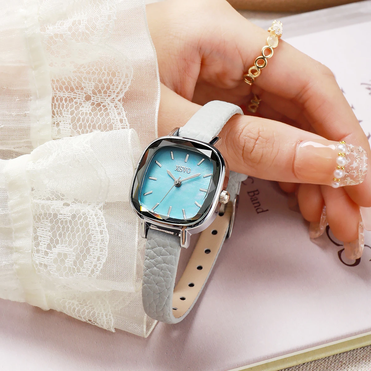 

XSVO Minimalist Oval Women's Watch - Faceted Crystal Bezel Light Blue Dial, Silver Case Gray Leather Strap Quartz Wristwatch for