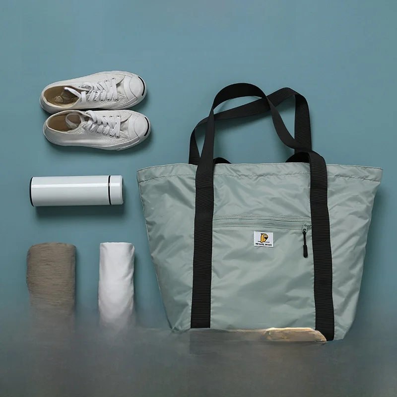 

Large Capacity Nylon Travel Bag Handheld Short Trip Storage Bag Waterproof Japanese Style Brand Ptravel Foldable Luggage Bag