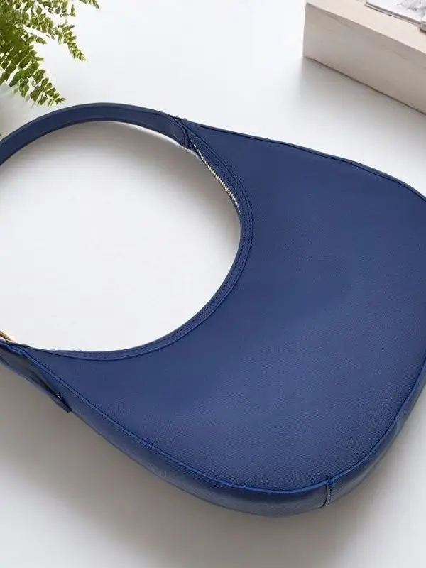 

Moon Phase Underarm Bag Unique Design Single Tail Cargo Irregular ape New Moon Bag Medium Size Faionable Youth Bag