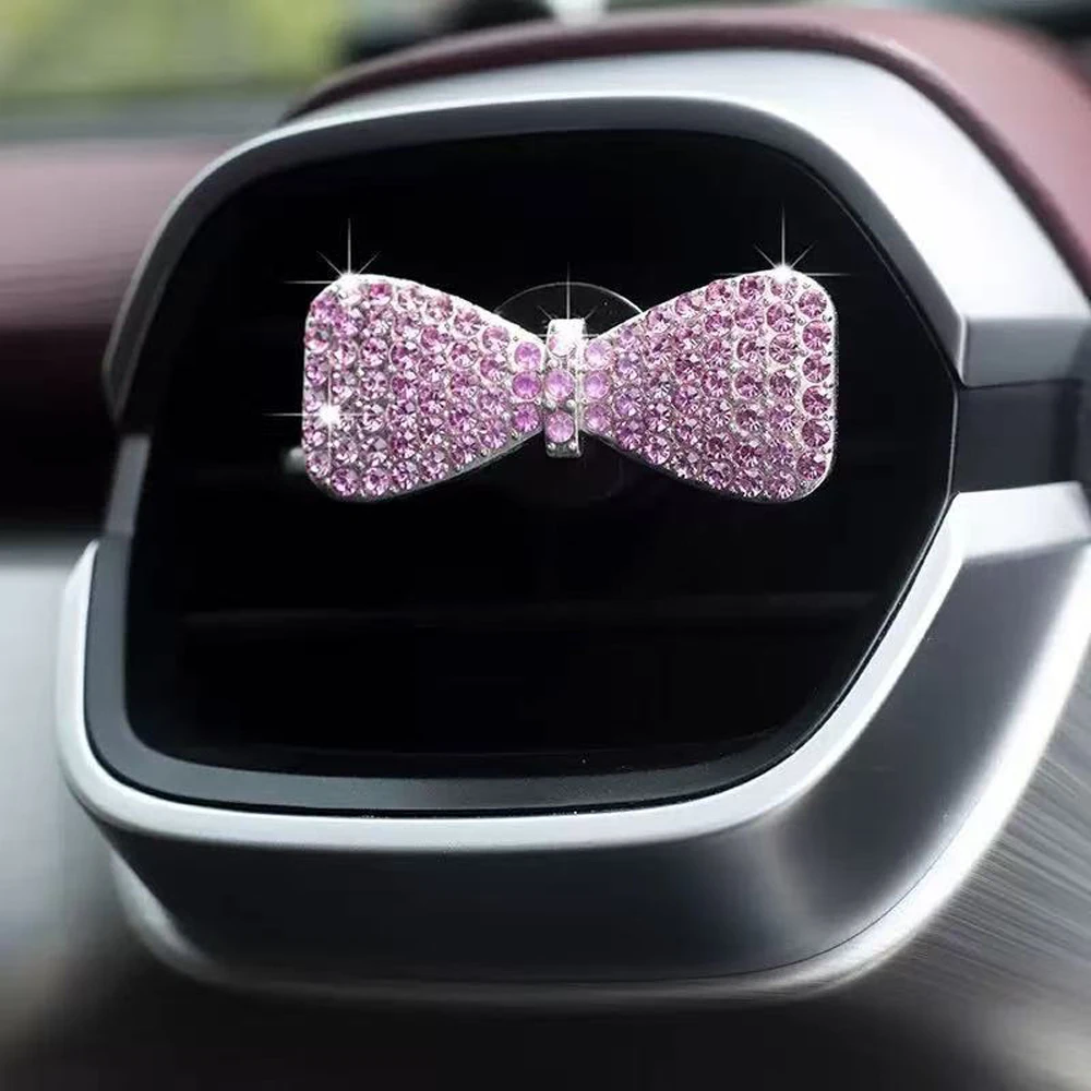 

Car air conditioner perfume clip, with fragrance piece, white pink, metal bow, Austrian rhinestone inlay, fresh air in the car